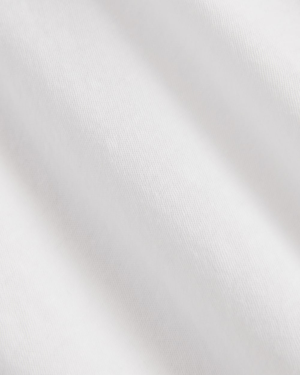 The Air V-Neck Henley in White — detail view