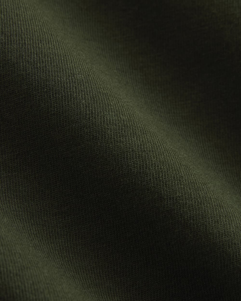 The Box-Cut Tee in Essential Cotton in Dark Green — detail view