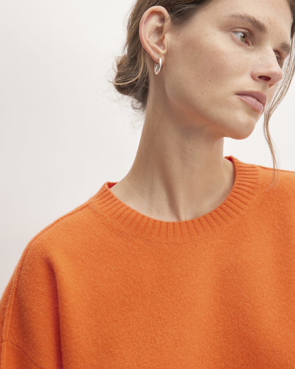 The Good Merino Wool Crewneck Sweater in Orange — detail view