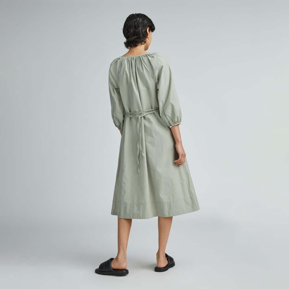 The Raglan Sleeve Poplin Dress in Seagrass — detail view