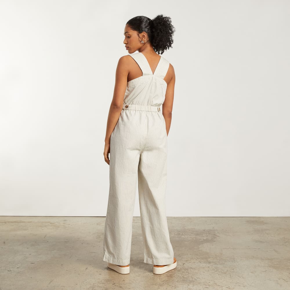 The Fatigue Apron Jumpsuit in Navy Stripe — detail view
