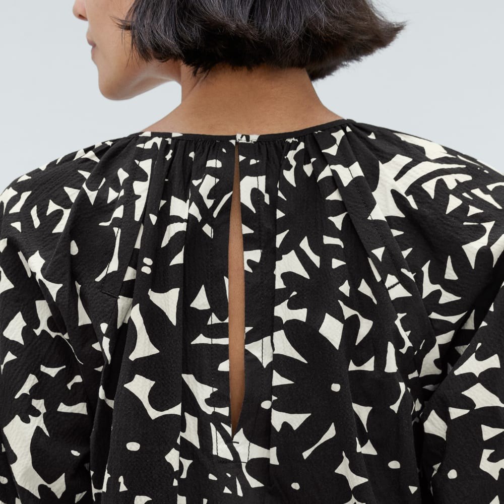 The Seersucker Puff Sleeve Dress in Black / Canvas Floral — detail view