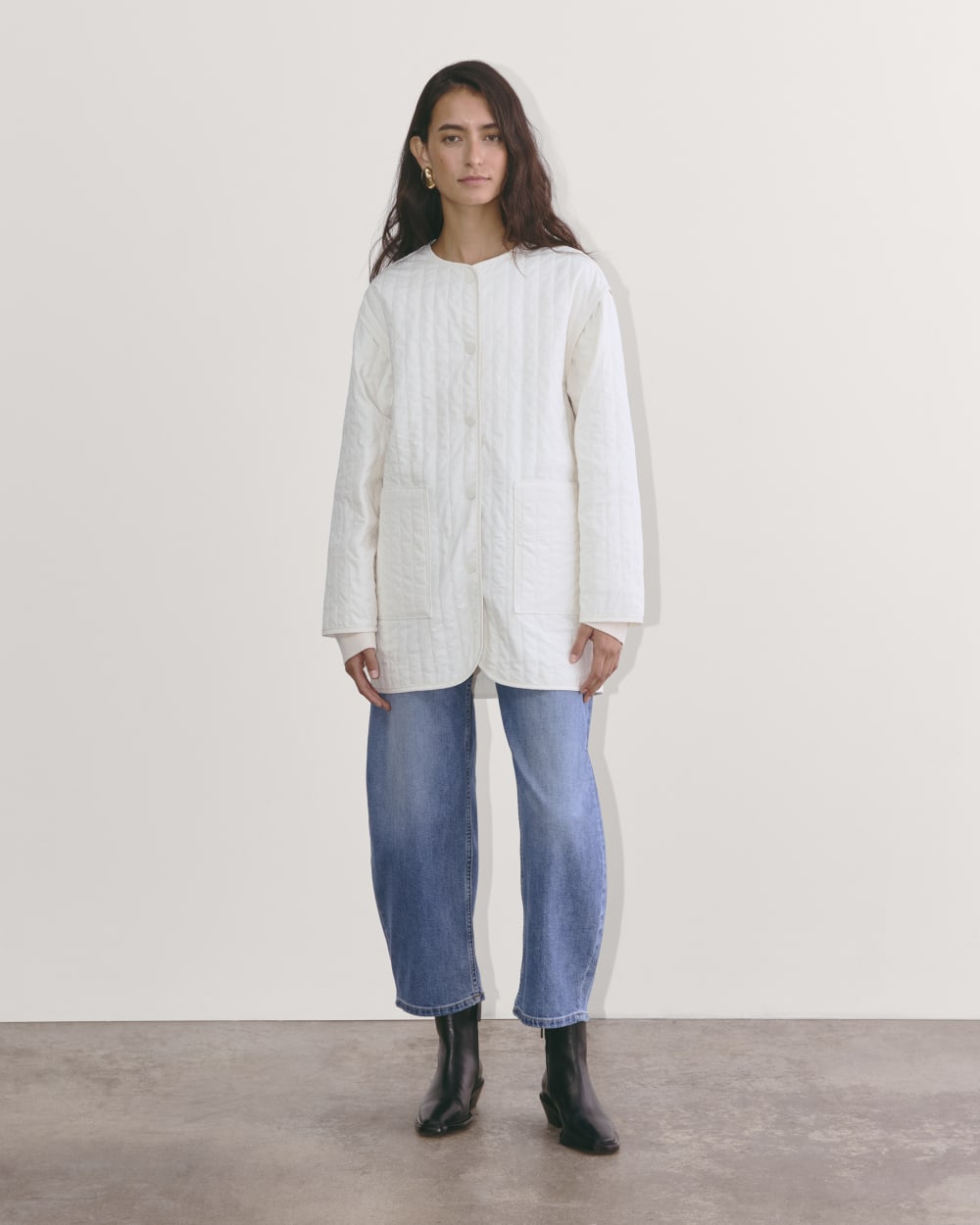The Midi Quilted Liner in Bone — detail view