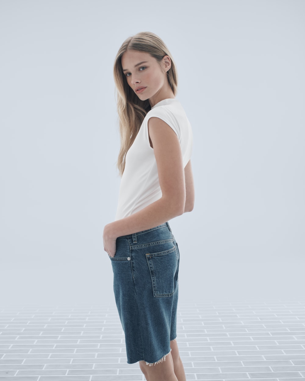 The Form Funnel-Neck Bodysuit in White — detail view