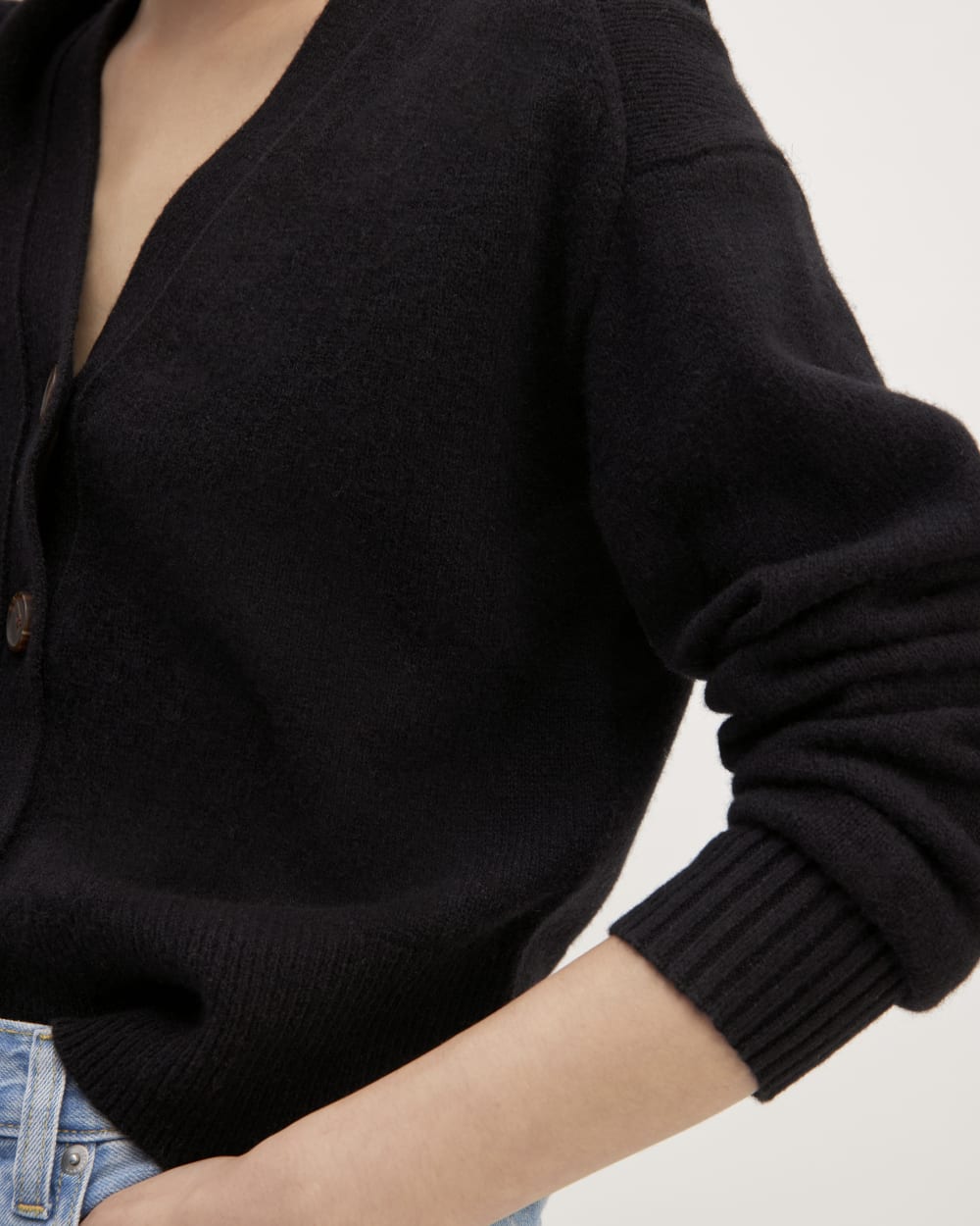 The Cashmere Cardigan in Black — detail view