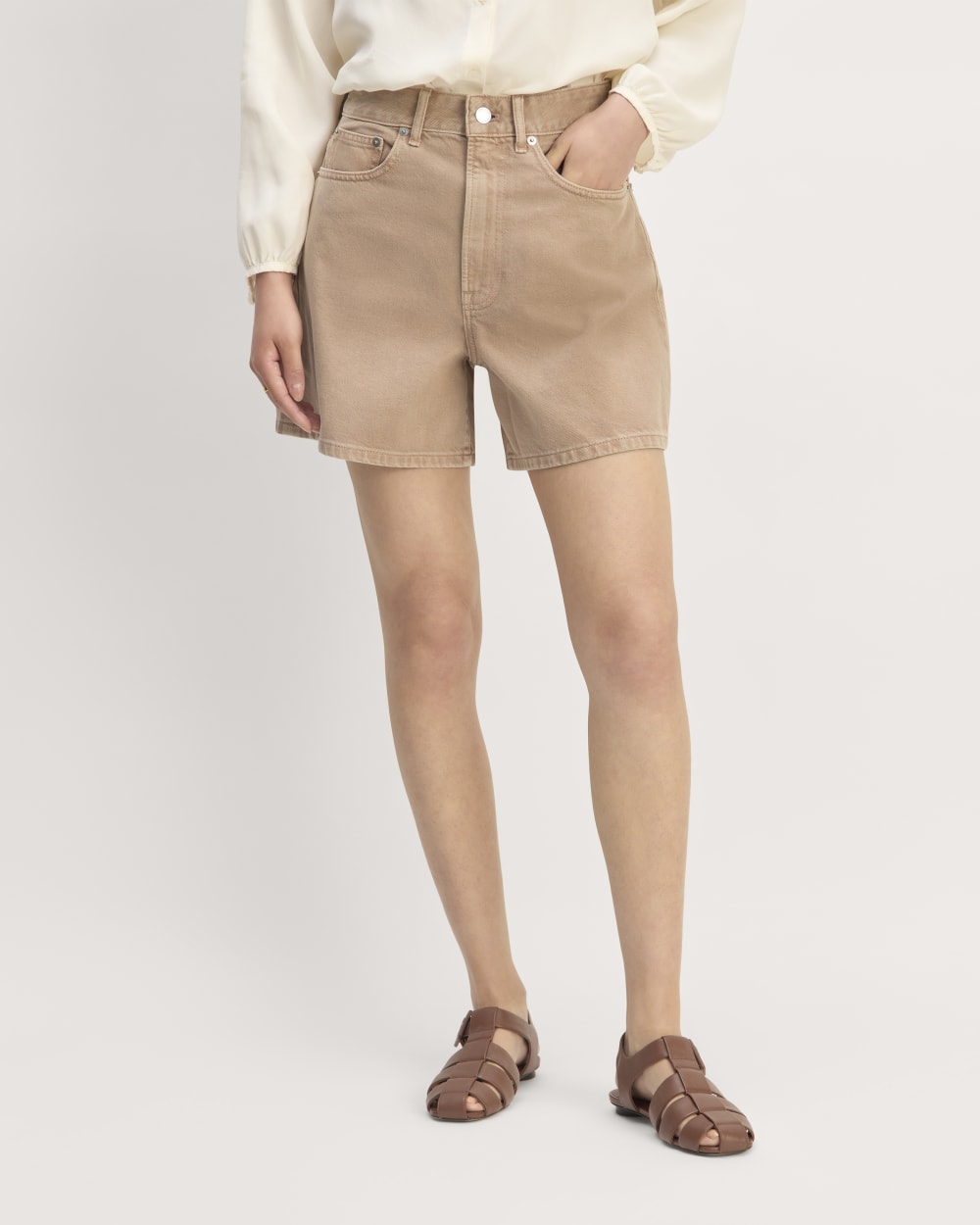 The A-Line Denim Short in Neutral Chanterelle — detail view