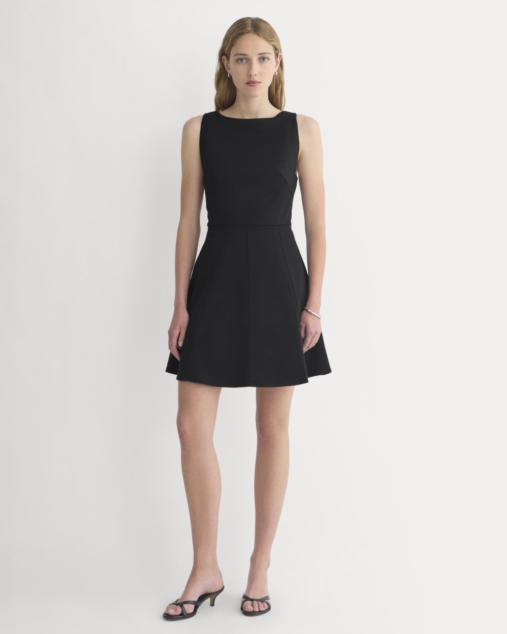 Seamed Open-Back Mini Dress in Black — front view
