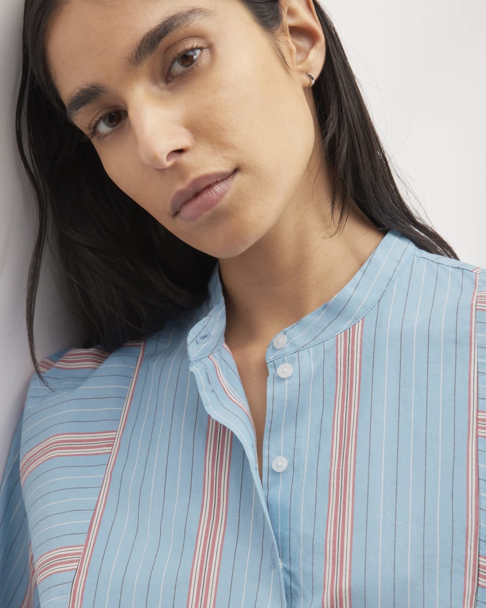 The Oversized Raglan Shirt in Parisian Blue / Black / Rusted Red / Bone — detail view