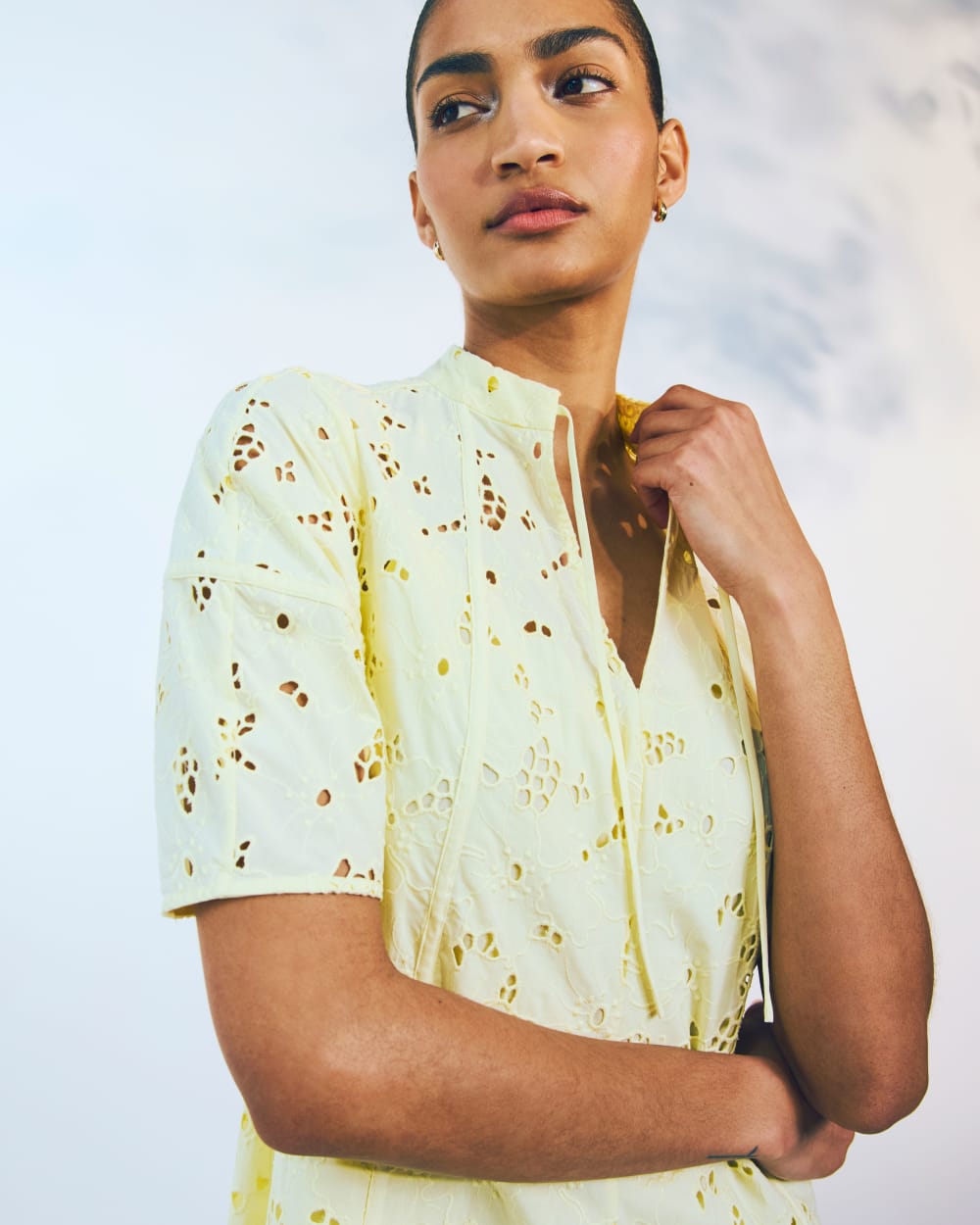The Eyelet Midi Dress in Light Yellow — detail view