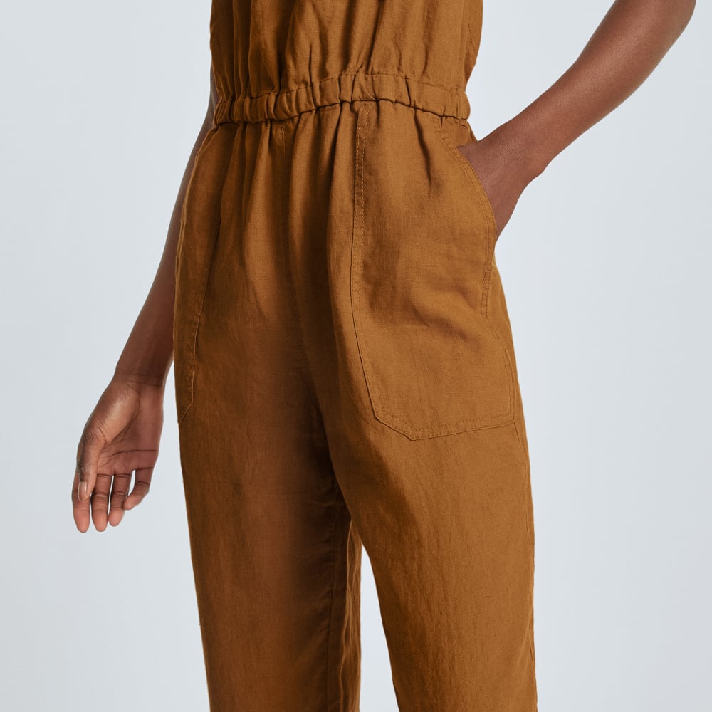 The Linen Shoestring Jumpsuit in Tawny Brown — detail view