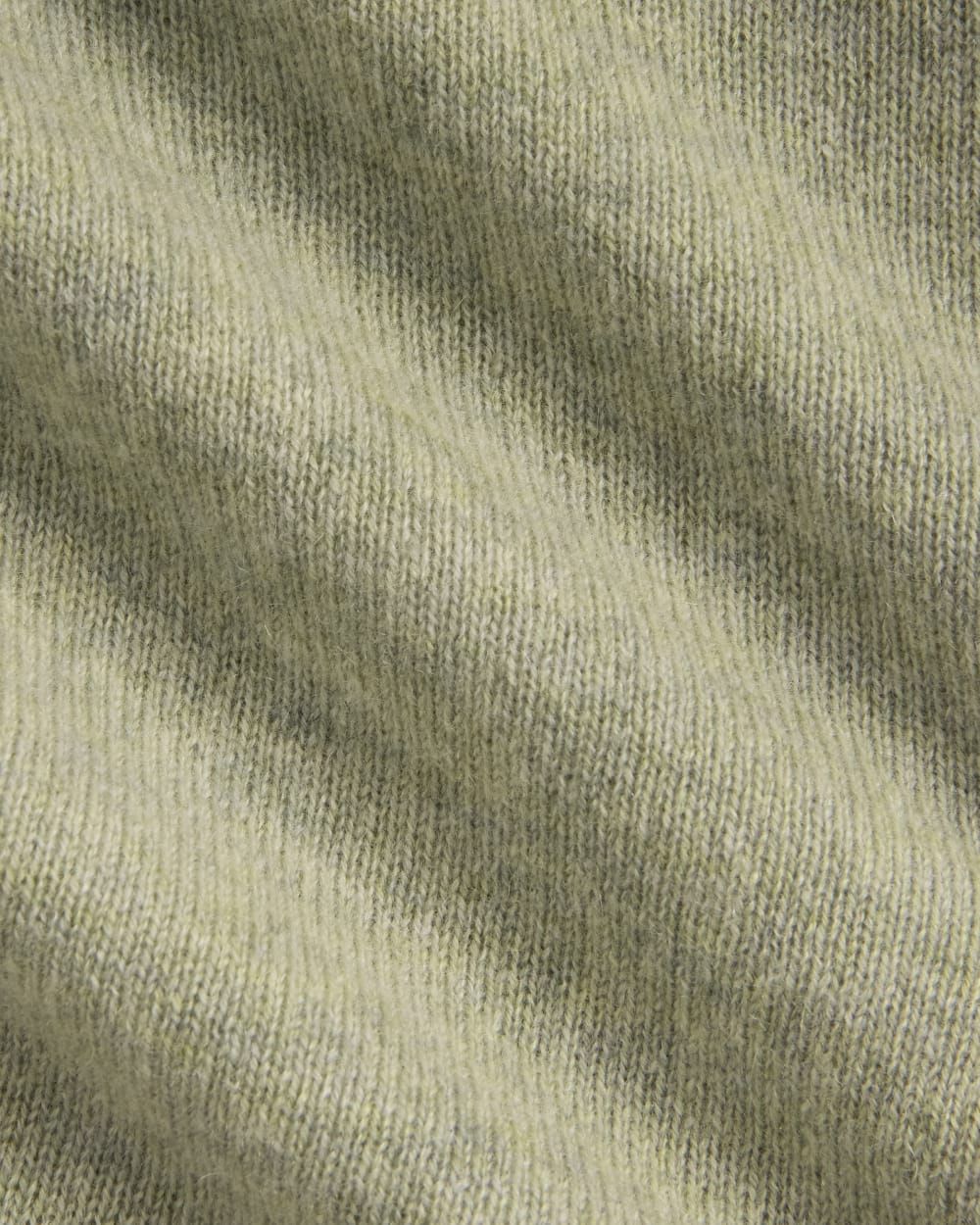 The Classic Cardigan in Cashmere in Light Heathered Moss — detail view