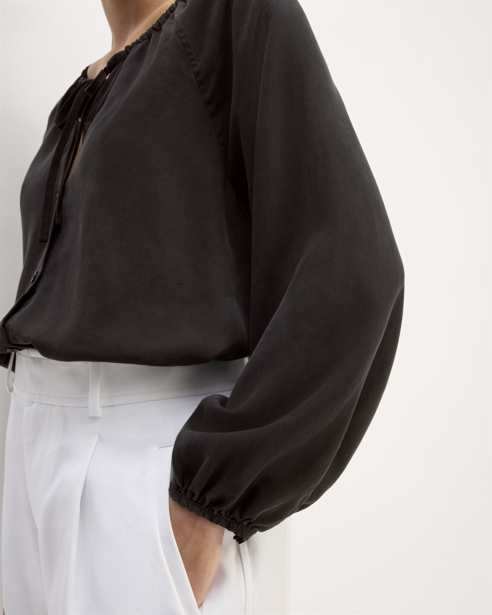 The Gathered Shirt in Butterlite in Black — detail view