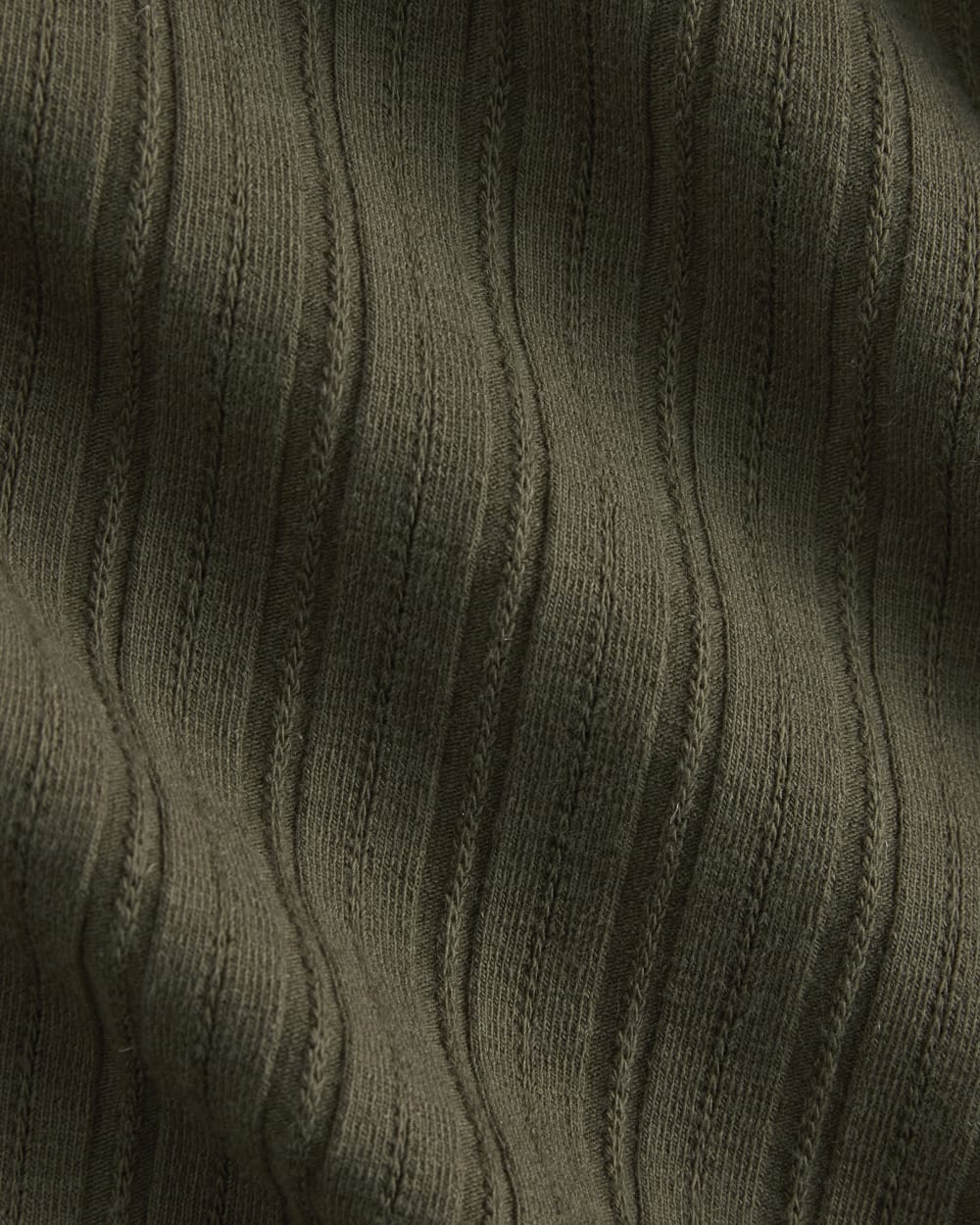 Cardigan in Pointelle in Olive Night — detail view