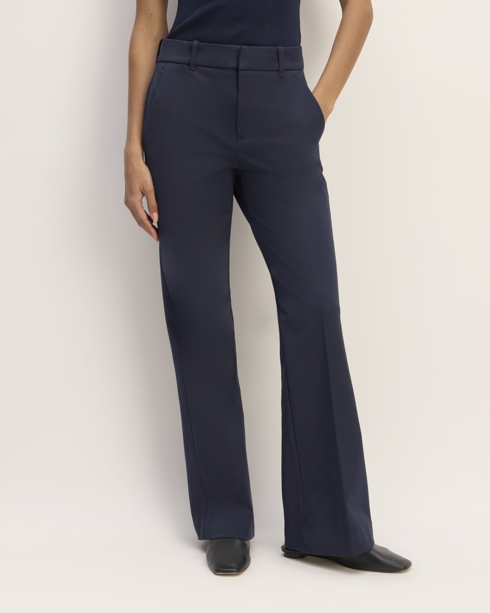 The Bi-Stretch Flare Pant in Navy — detail view