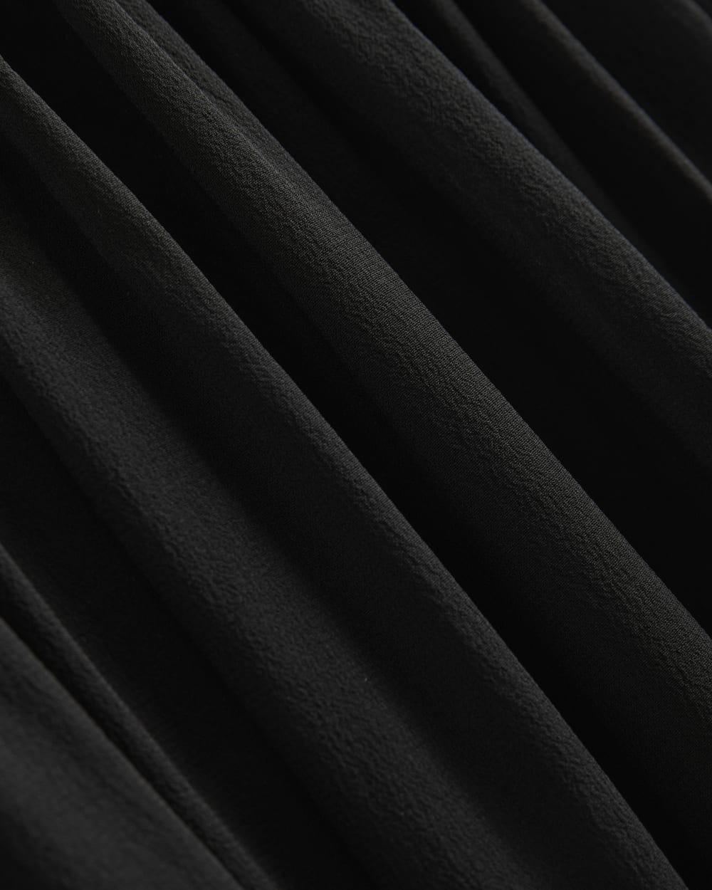 Twisted Pleated Mini Dress in Silk Georgette in Black — detail view