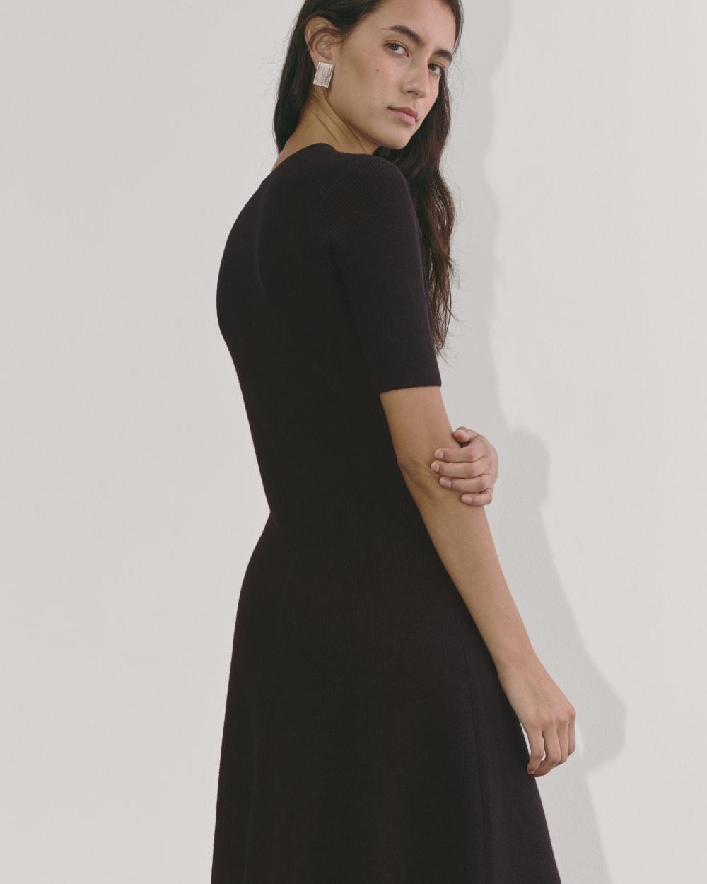 The Ribbed Sweater Dress in Black — detail view