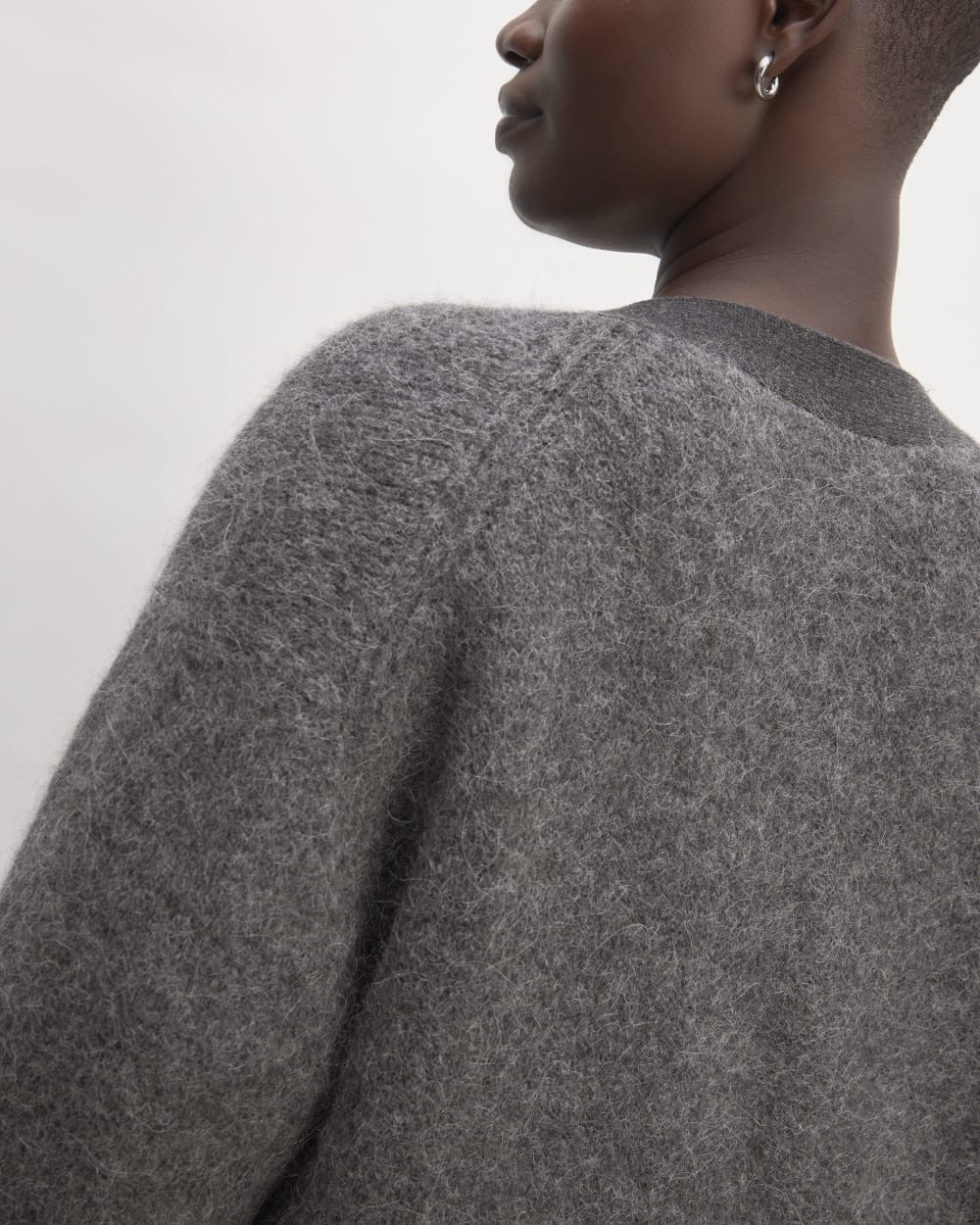 The SuperFuzz Alpaca Cardigan in Dark Charcoal — detail view