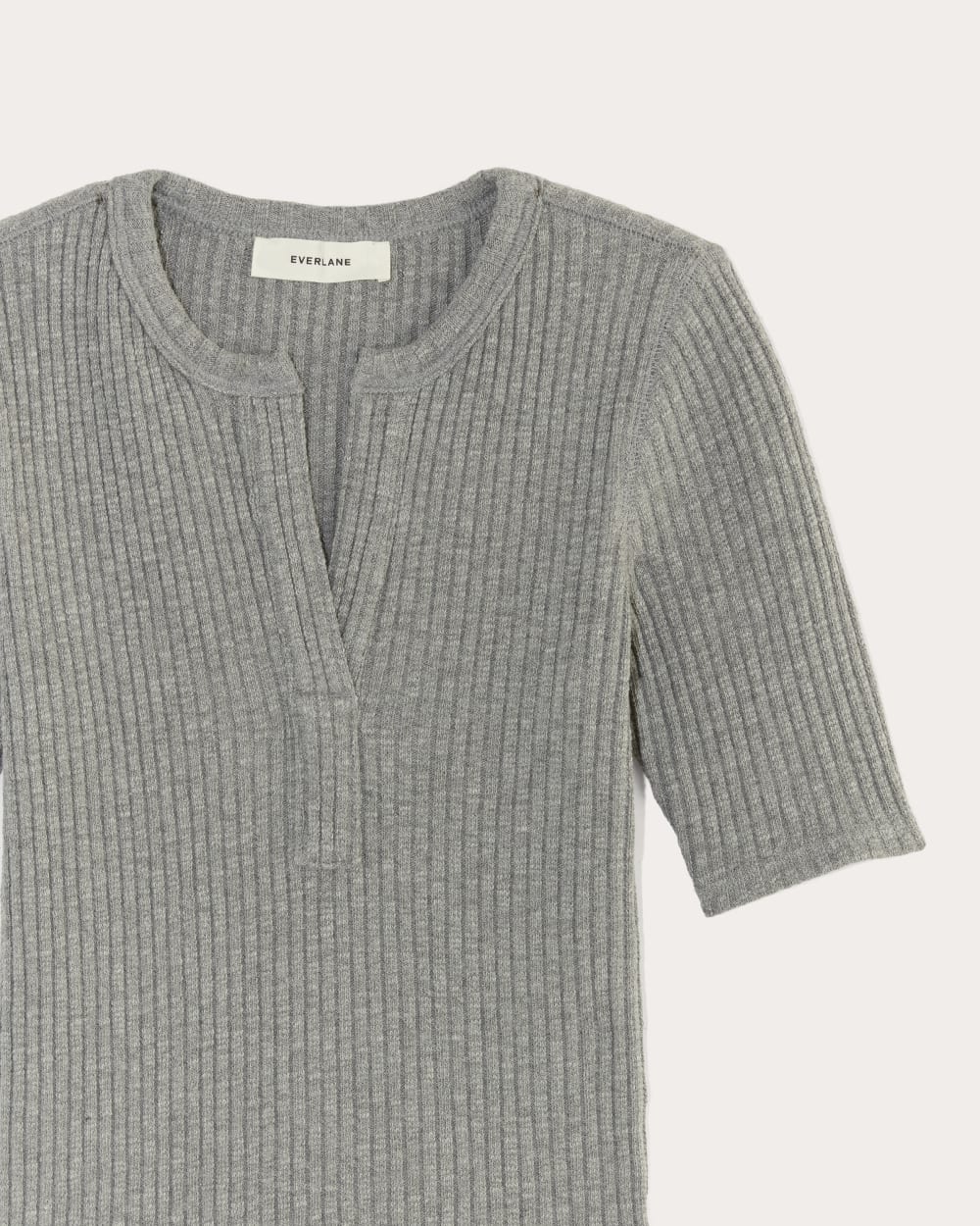 The Rib-Knit Short-Sleeve Henley in Mid Heather Grey — detail view