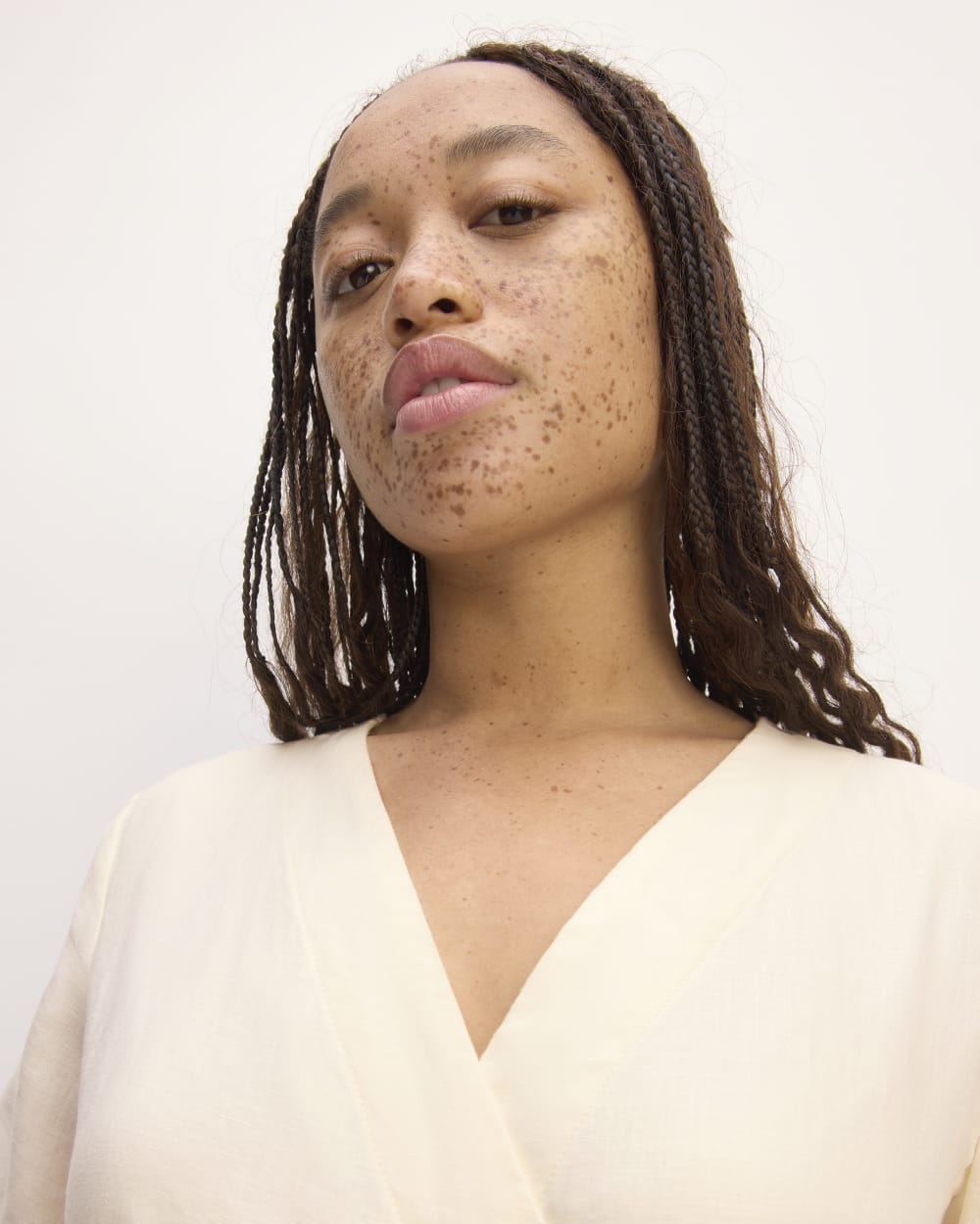 The Wrap Dress in Linen in Bone — detail view