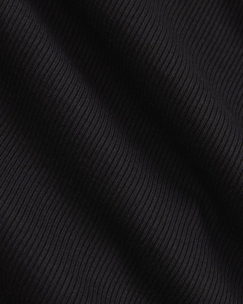 Luxe Rib V-Neck Henley in Black — detail view