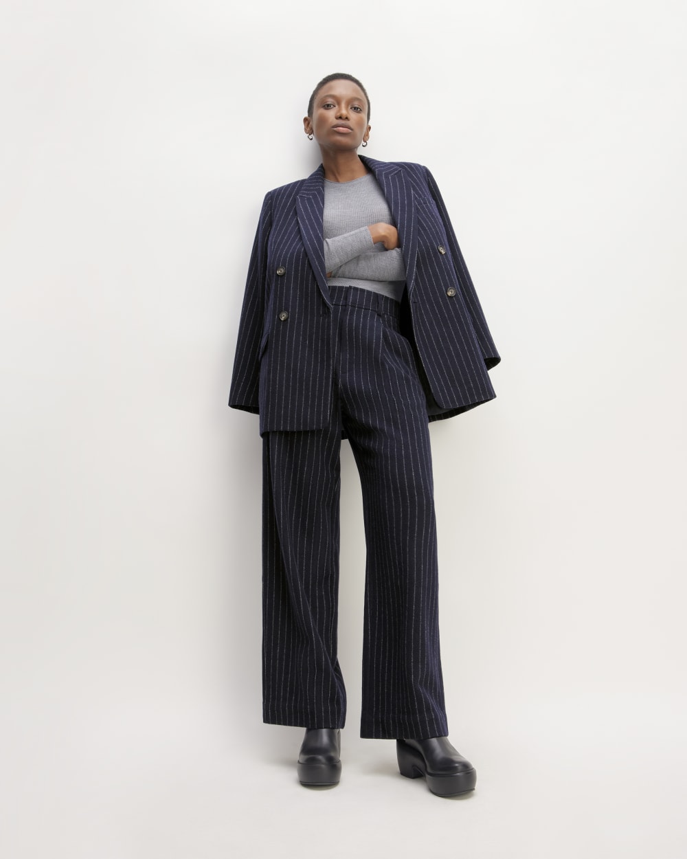 The ReWool® Way-High Drape Pant in Navy / Bone — front view