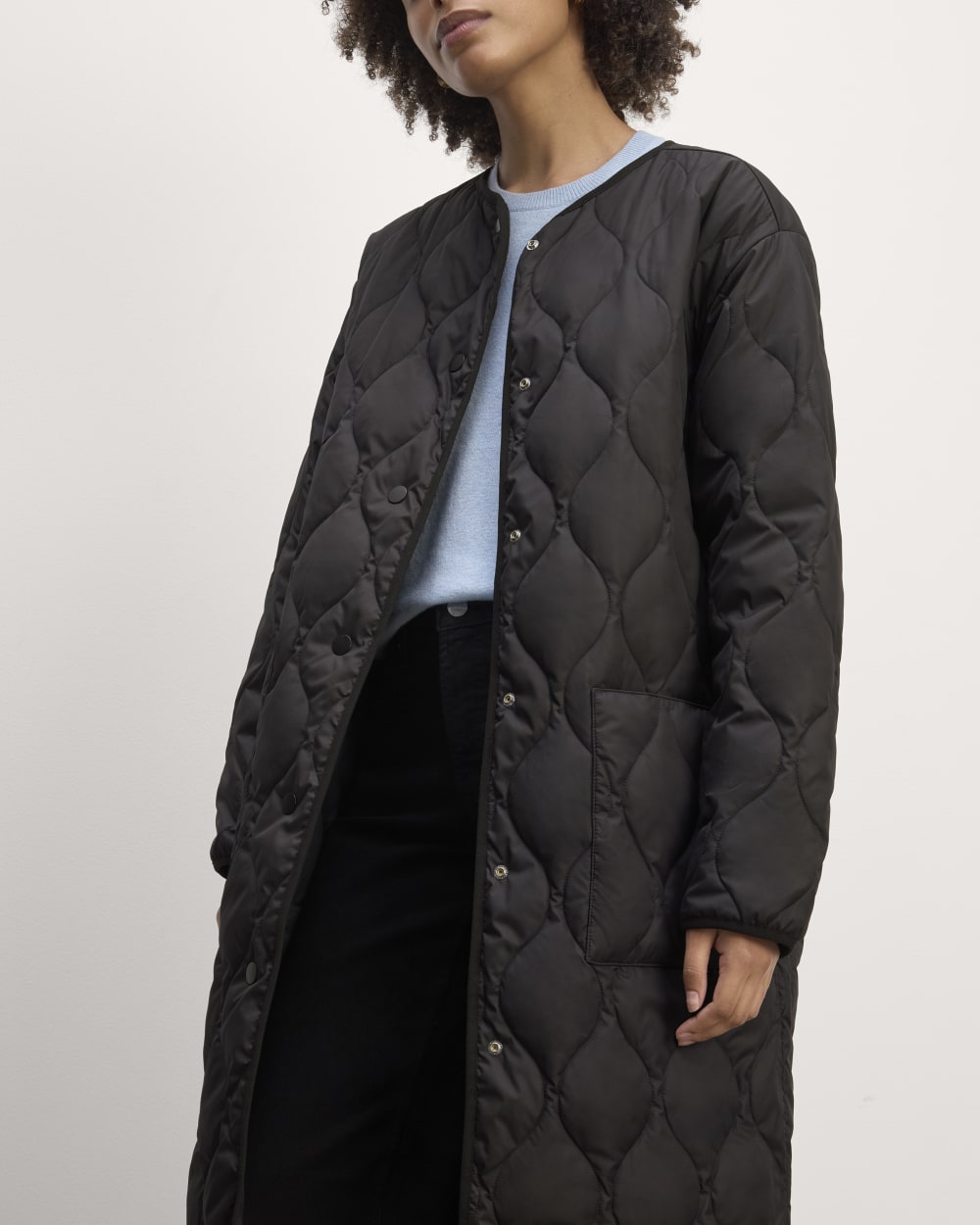 The Long Quilted Liner in Black — detail view