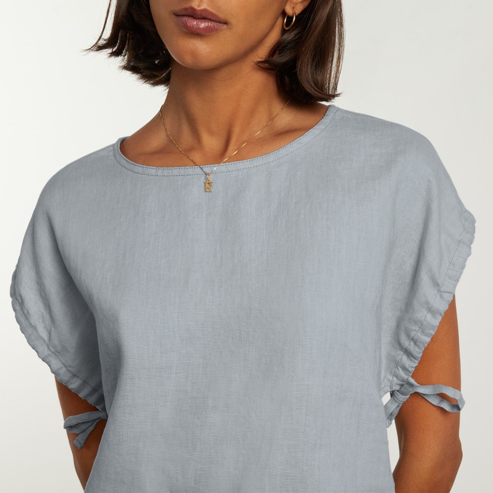 The Drawstring Tunic in Sky — detail view