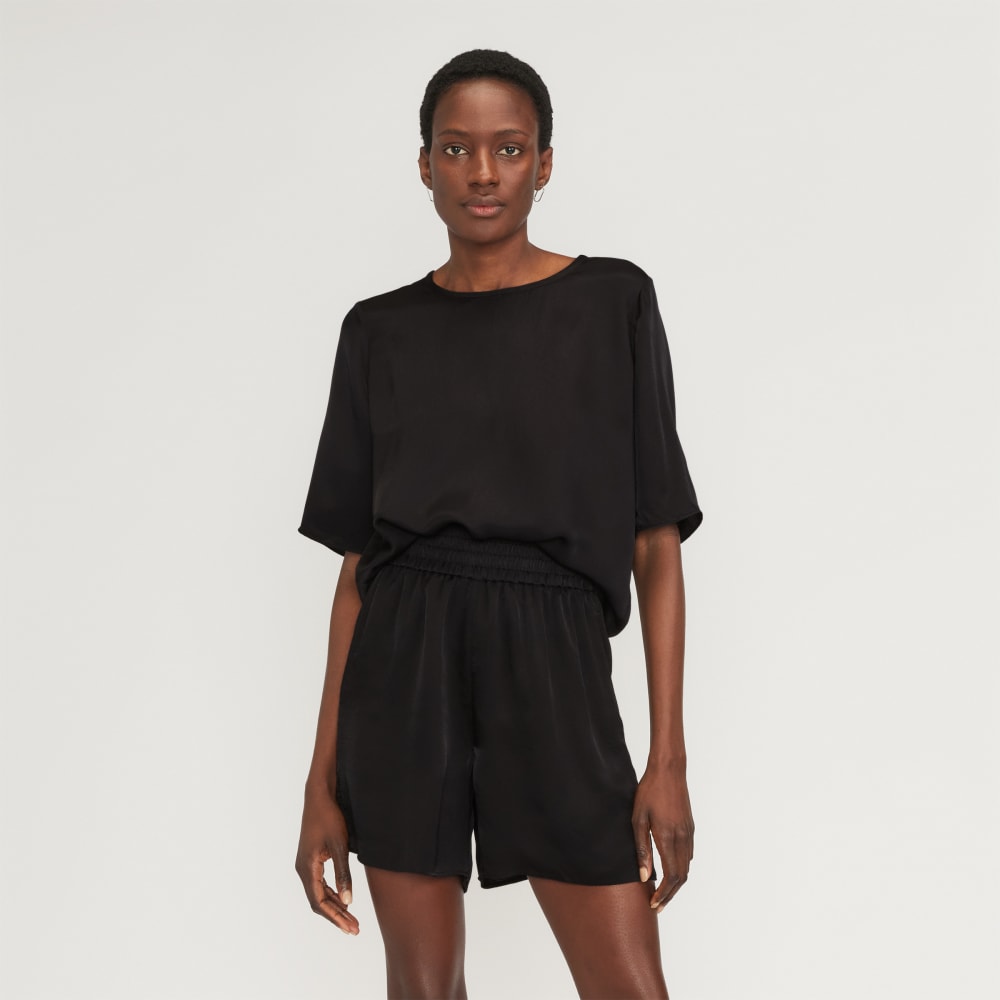 The Satin Relaxed Tee in Black — front view