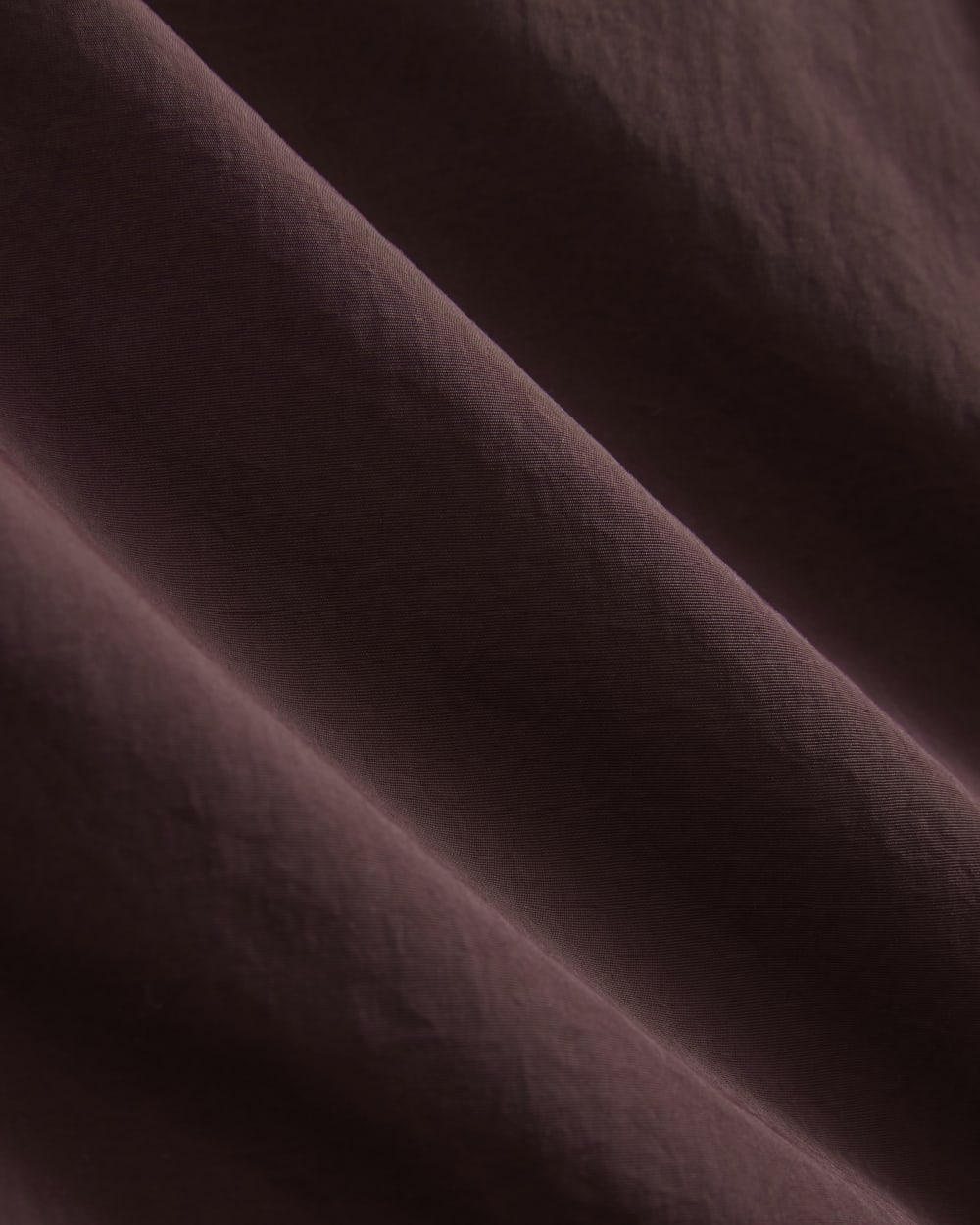 Renew Oversized Puffer Bomber in Deep Plum — detail view