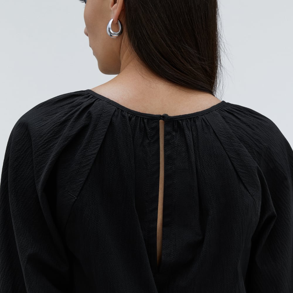 The Seersucker Puff Sleeve Dress in Black — detail view