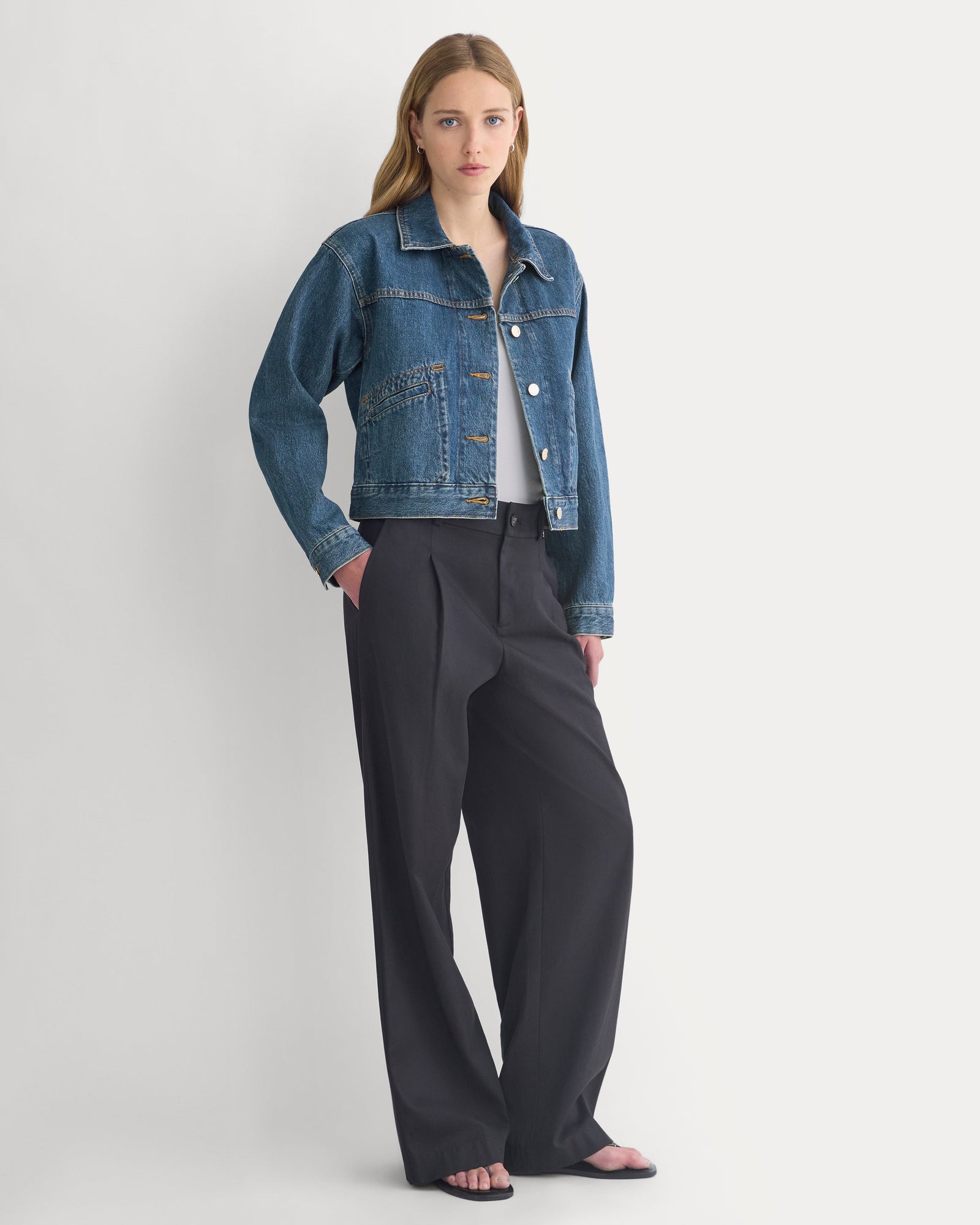 Cropped Trucker Jacket in Denim in Mid Indigo — detail view