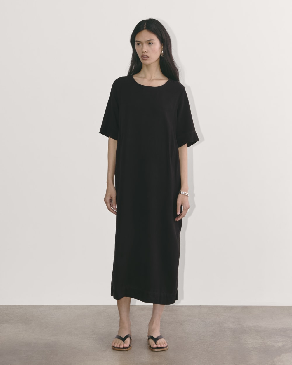 The Relaxed T-Shirt Dress in Buttersoft in Black — detail view
