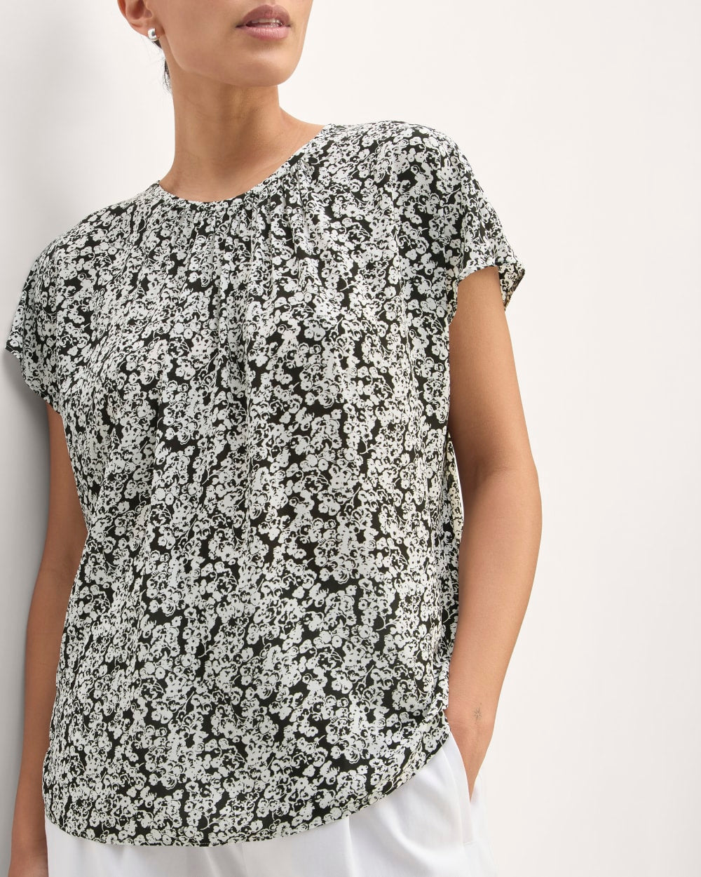 The Gathered Neck Top in Black / Bone Mini Floral — detail view