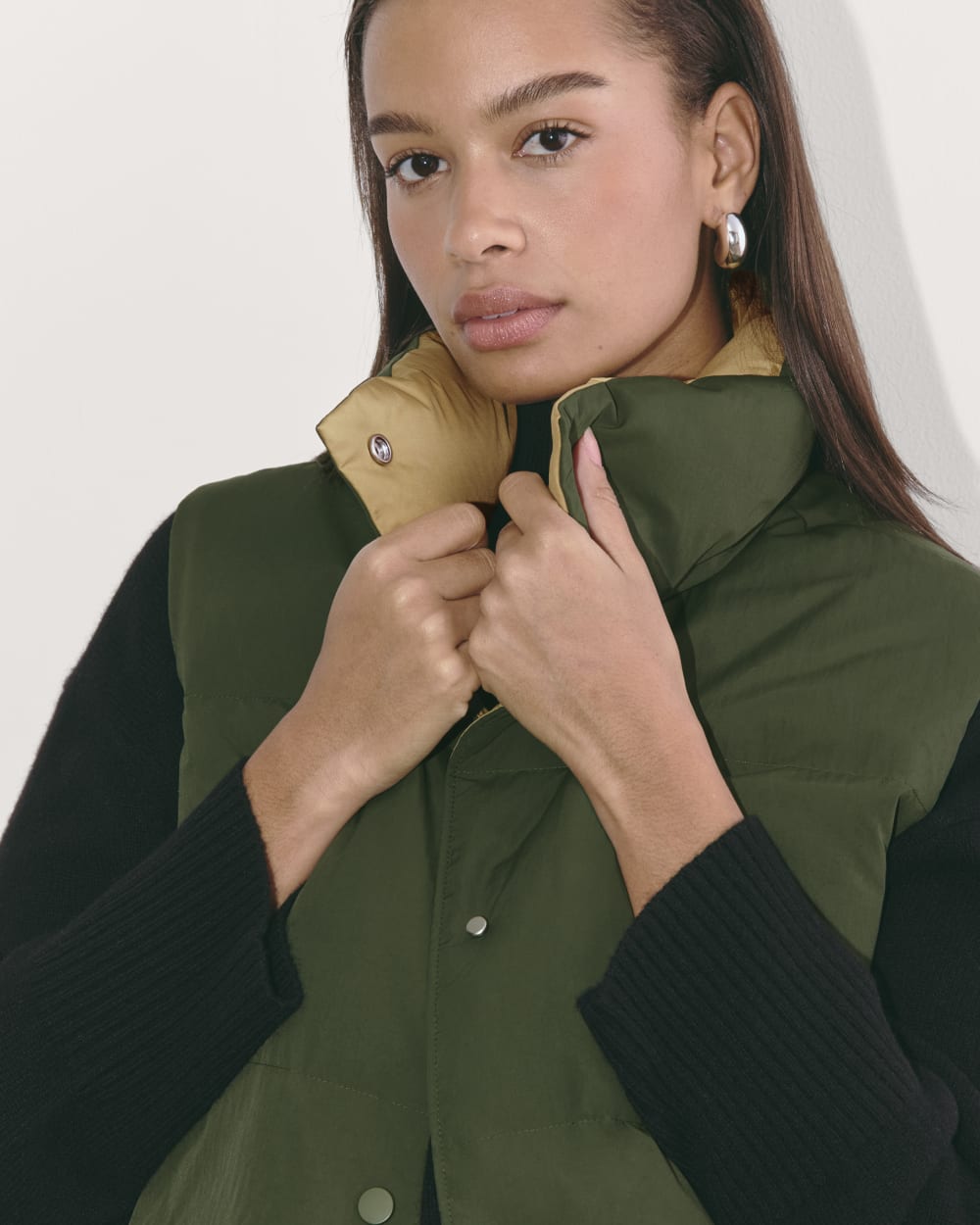 The Puffer Vest in Dark Forest — detail view