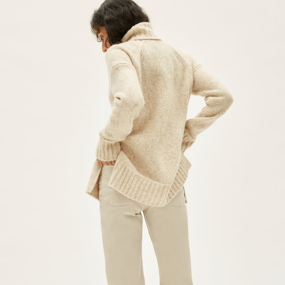 The Cloud Turtleneck in Heathered Ivory — detail view