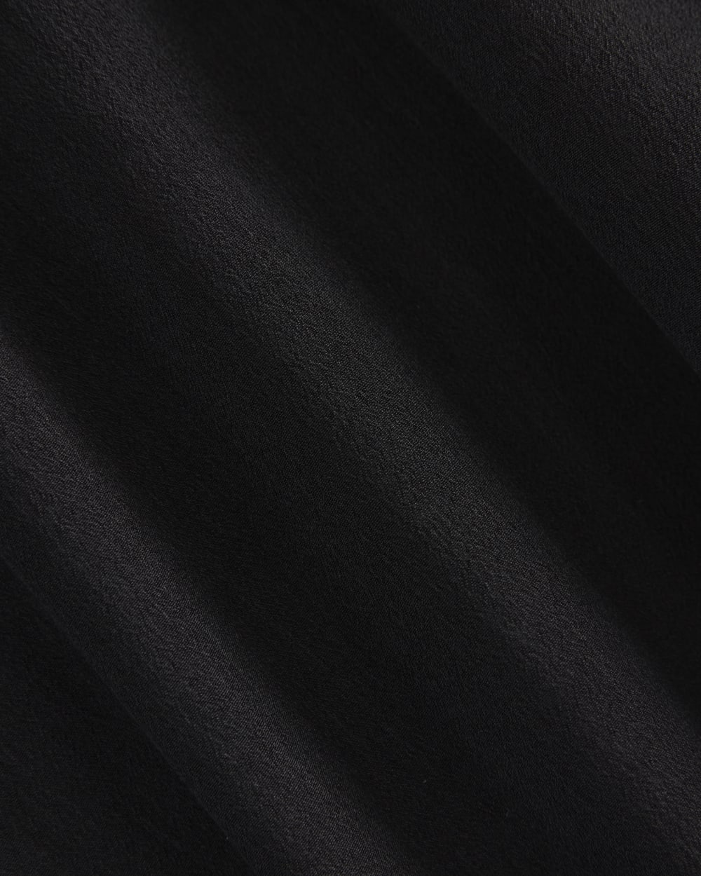 Sleeveless Seamed Dress in Black — detail view