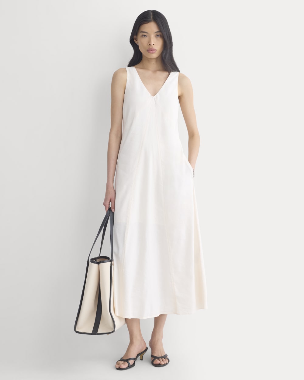 Deep V Seamed Dress in Stretch Linen in Bone — front view