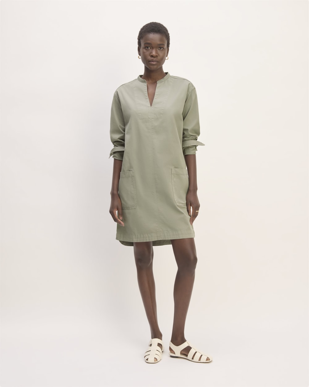 The Long-Sleeve Utility Mini Dress in Sage Green — front view