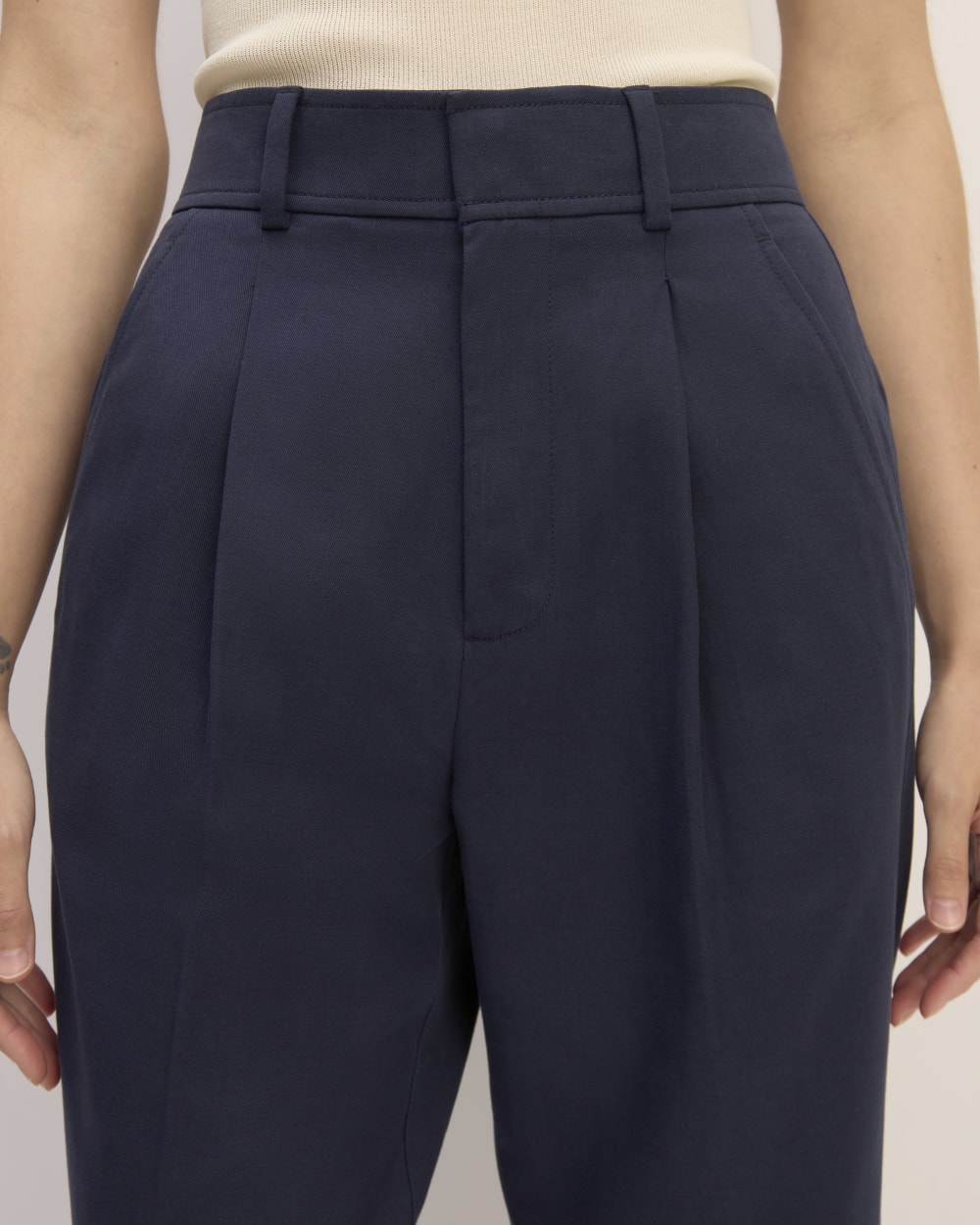 The Draper Tapered Pant in Buttersmooth in Navy — detail view