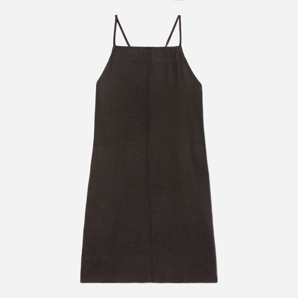 The Linen Apron Dress in Black — front view