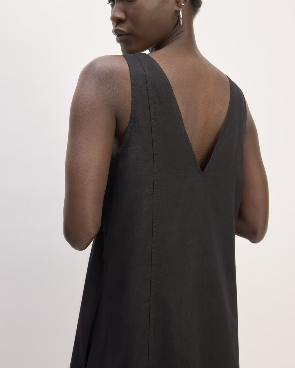 The Linen V-Neck Midi Dress in Black — detail view