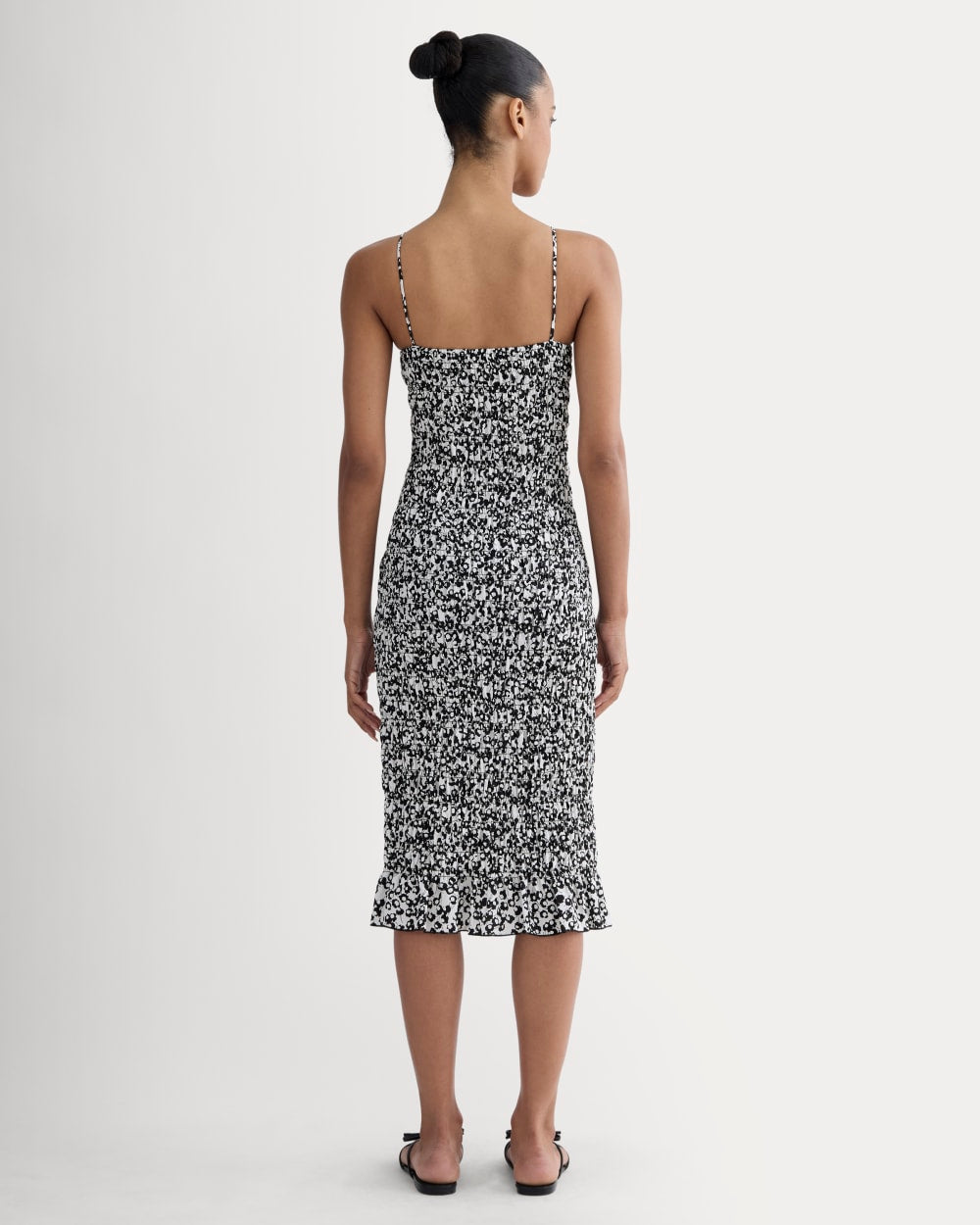 The Smocked Column Dress in Bone / Black Floral — detail view