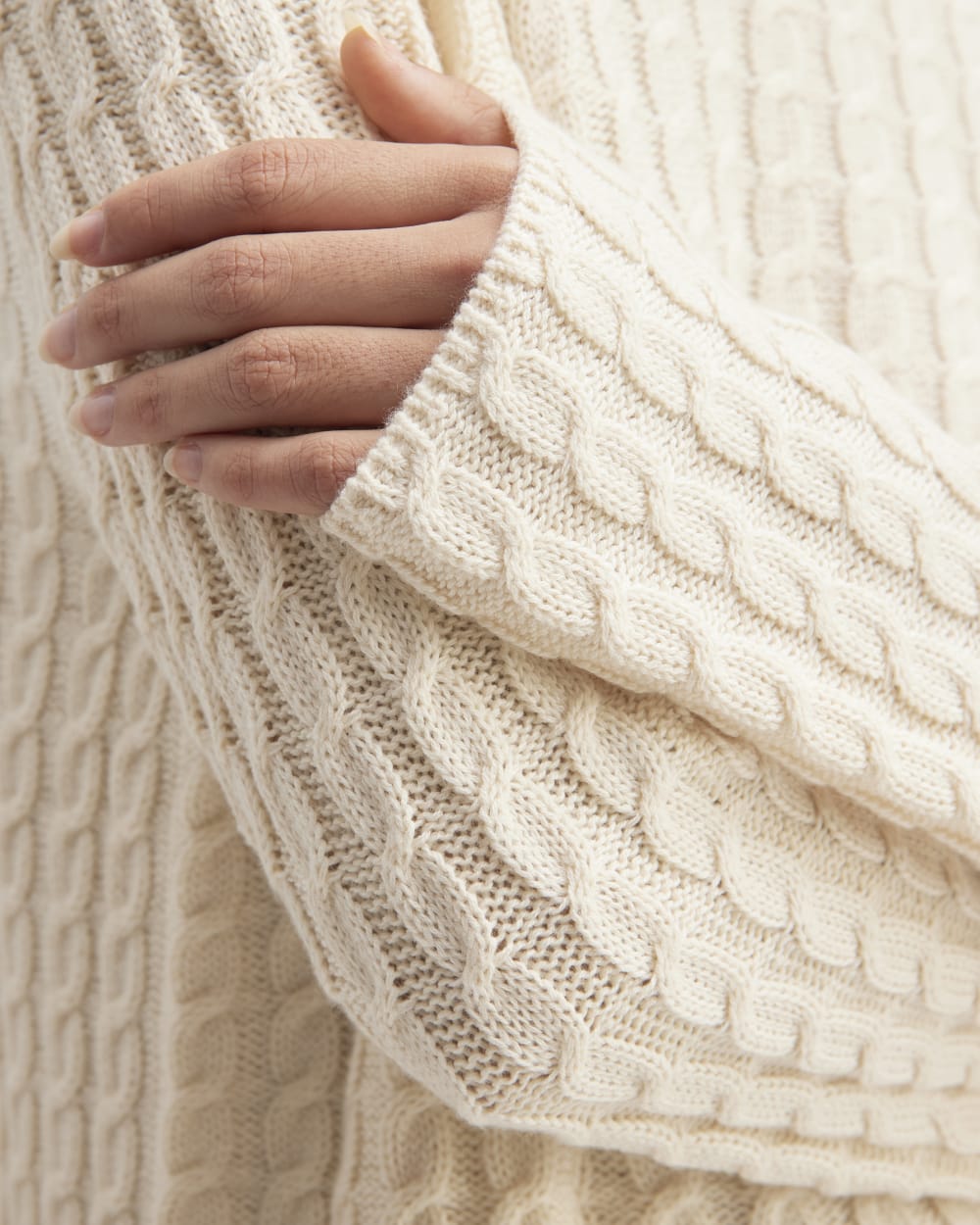 The Cotton Merino Cable Crew in Canvas — detail view