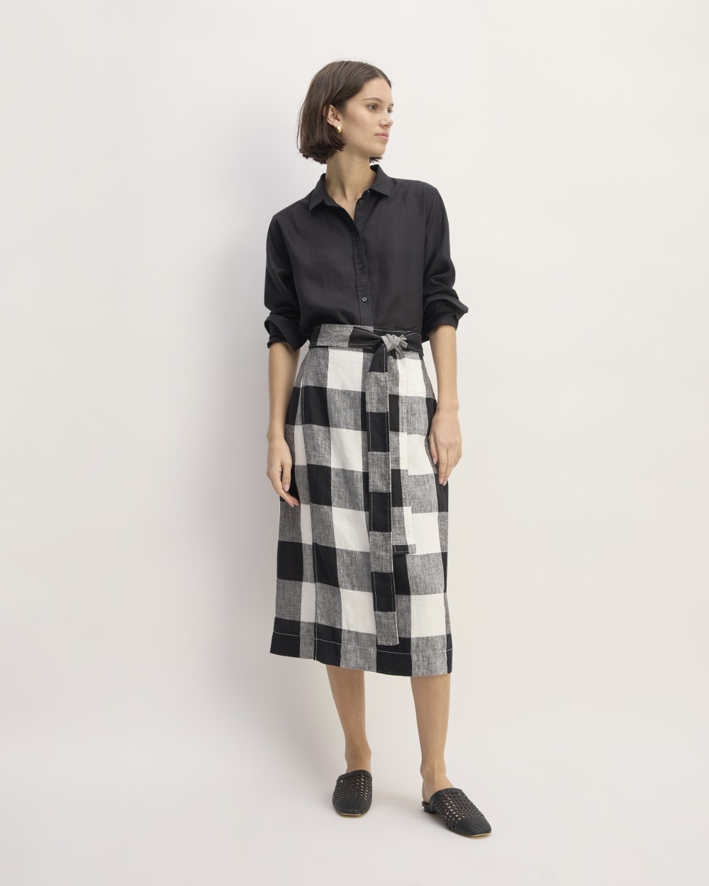 The Linen Wrap Skirt in Bone / Black Check — front view