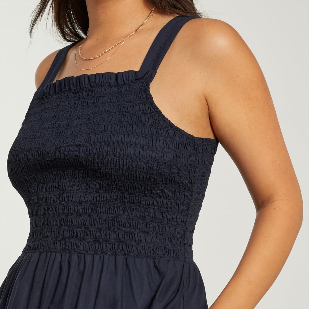 The Smock Dress in Deep Navy — detail view