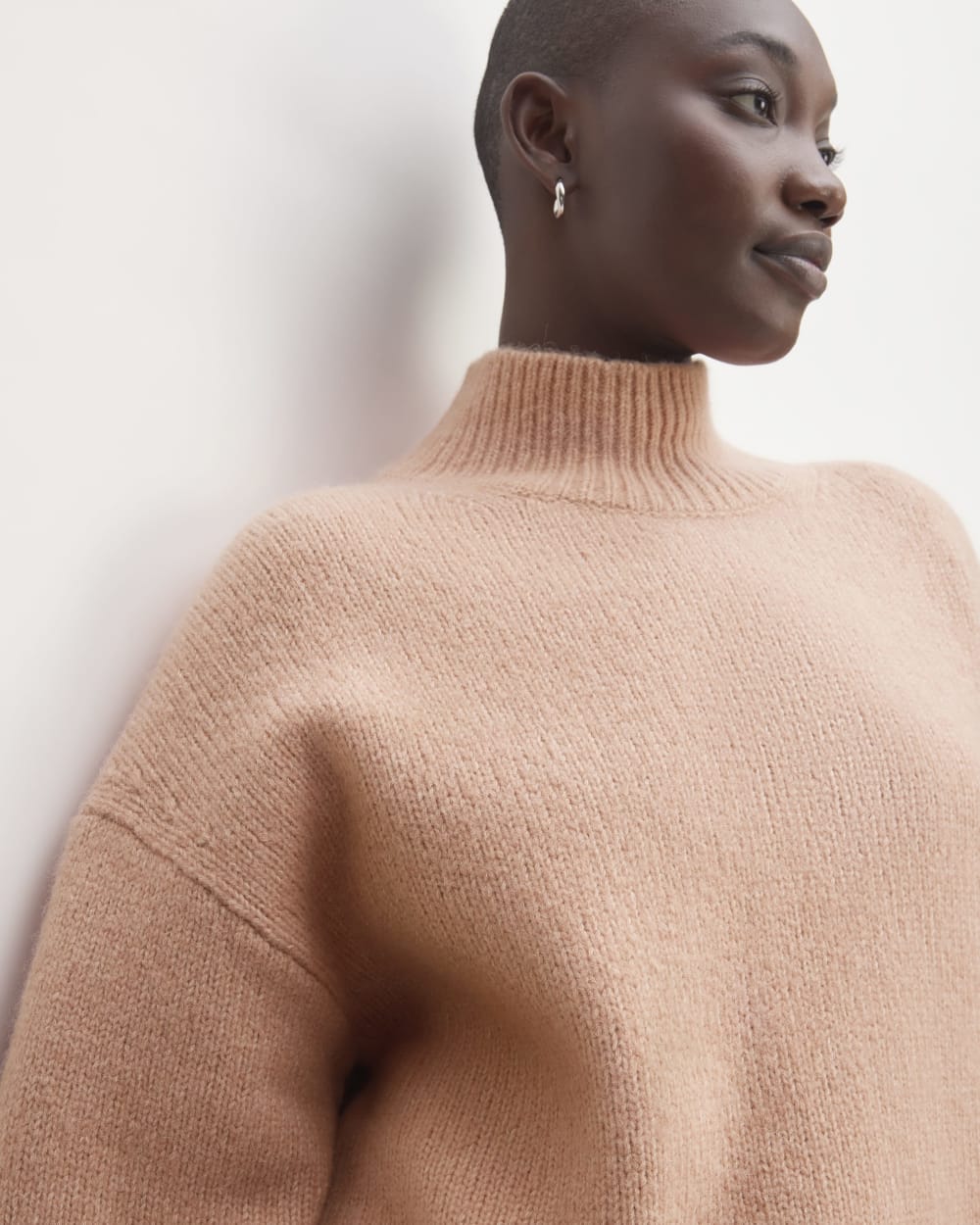 The Cloud Oversized Turtleneck in Blush Pink — detail view
