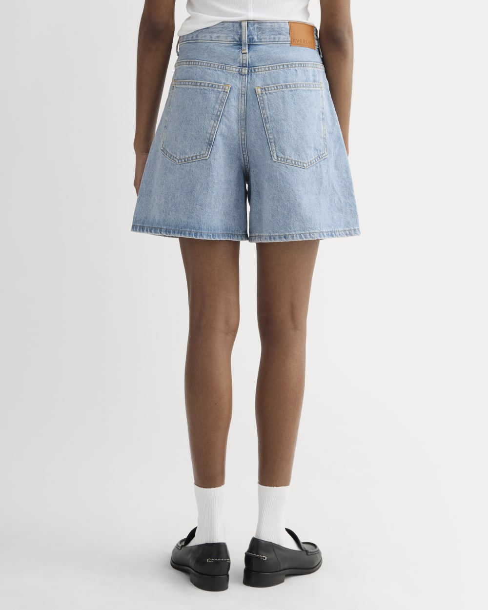 The A-Line Denim Short in Light Indigo — detail view