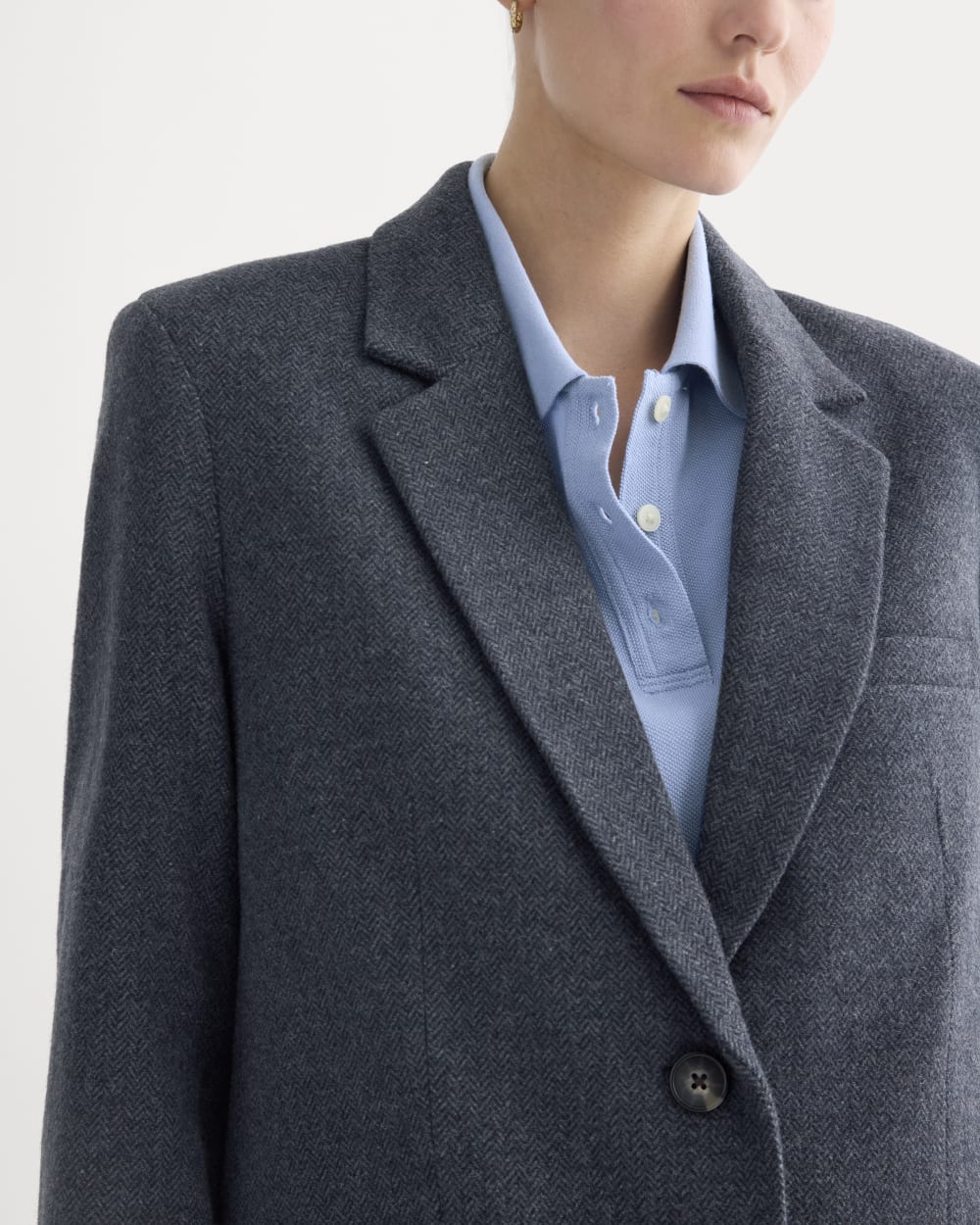 The Oversized Blazer in Wool in Navy Herringbone — detail view