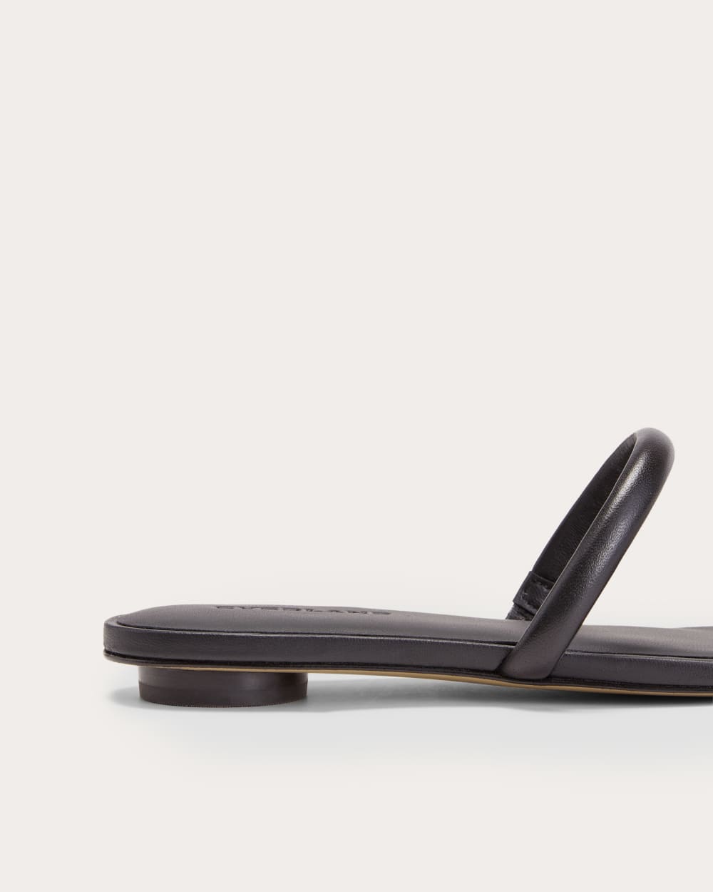 The Double Strap Sandal in Black — detail view