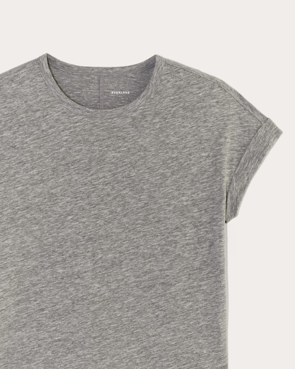 The Perform Tee in Heathered Grey — detail view